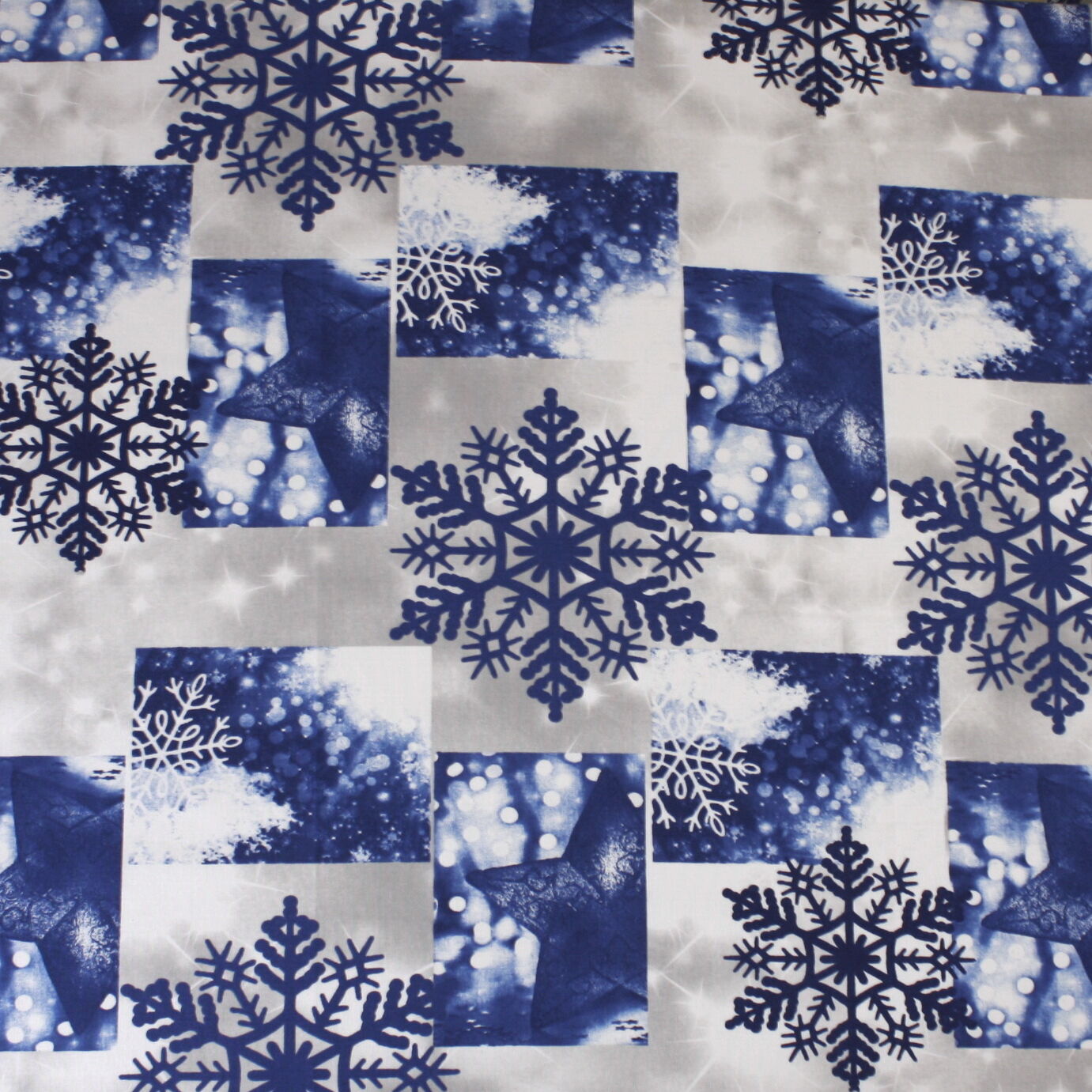 Stoff Meterware Schneeflocke Blau