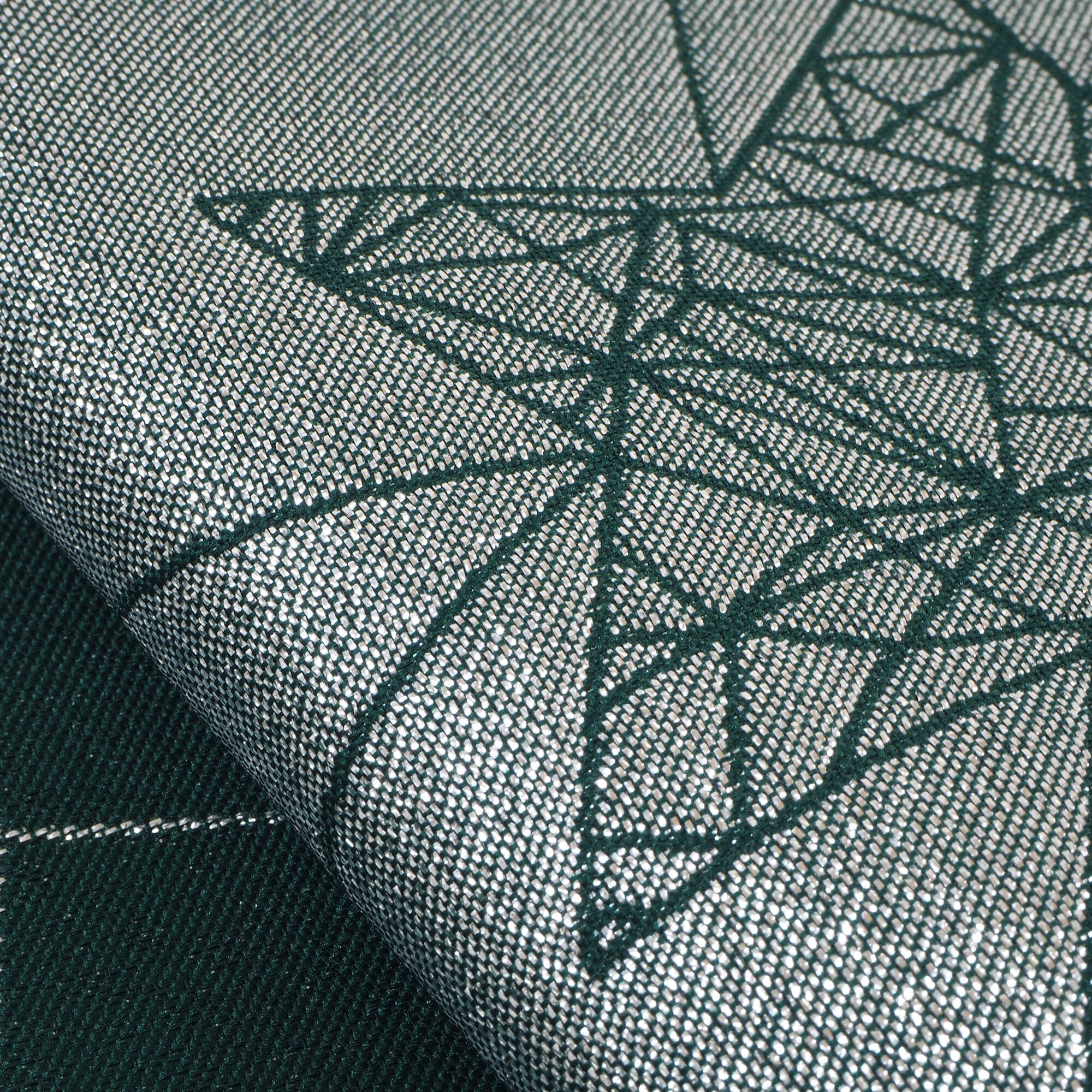 Stoff Meterware Sterne Silber auf Grün Jacquard